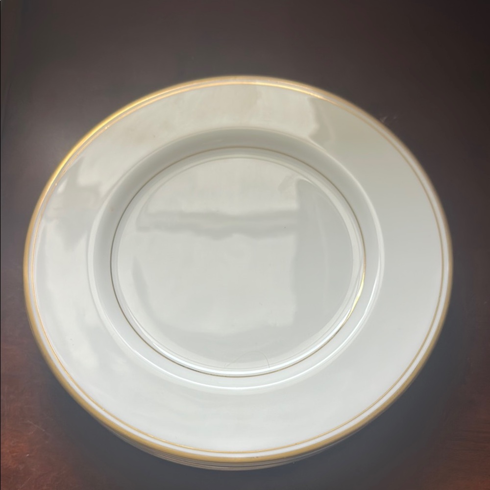 Mikasa White and Gold Porcelain salad plates .